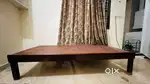 Wooden single bed