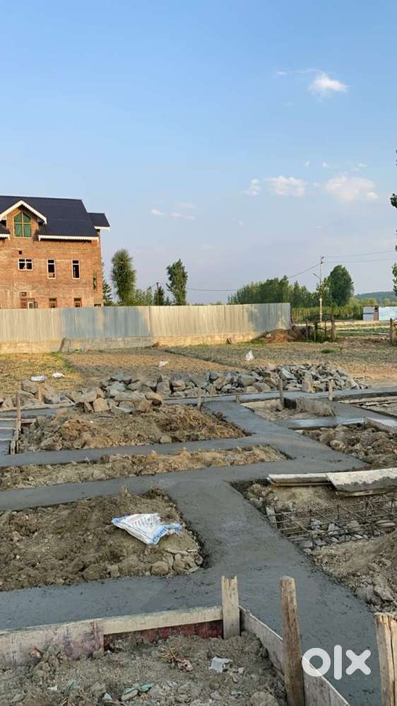 14 malra land , corner plot for sale in narkara budgam .