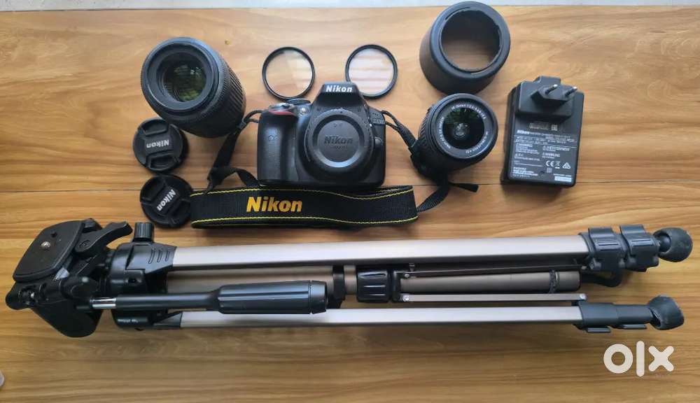 Nikon D3300 with zoom lens and Tripod