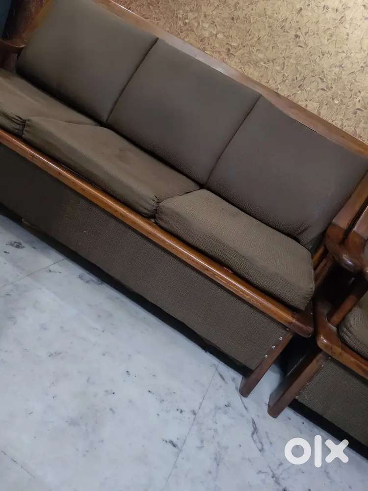 5 seater sofa in brown colour old wooden work