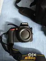 Nikon Camera with lens , battery and cover