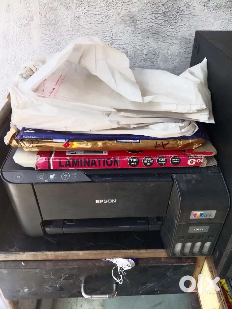 Xerox machine? lamination machine ? Mobile machine.  Counter table.