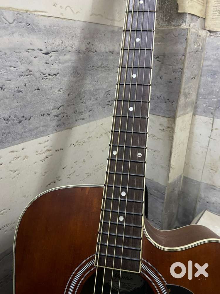 Imported Solid Top Guitar