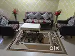 5 seater leather sofa (3+1+1) along with Center Table