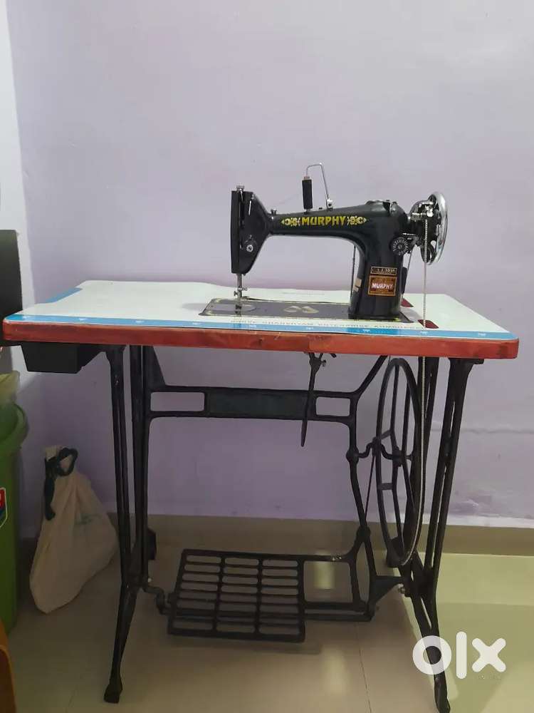 Sewing machine with table stand