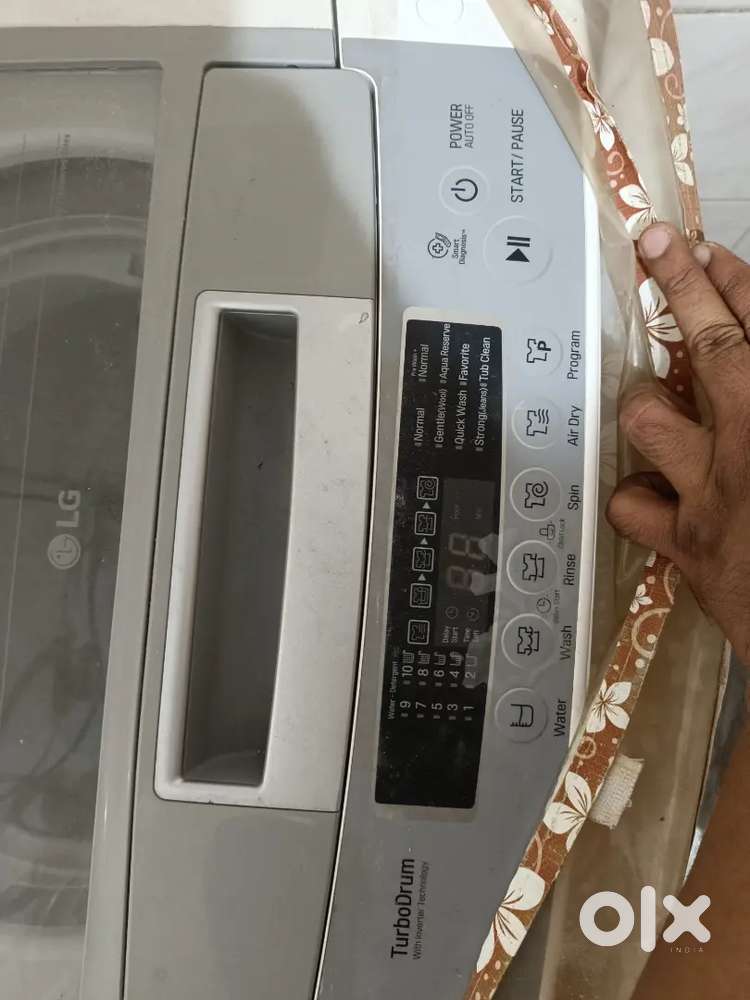 LG TOP LOAD WASHING MACHINE TURBODRUM WITH INVERTER TECHNOLOGY.