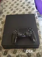 PlayStation 4 Slim 1TB + 4 Games - Excellent Condition