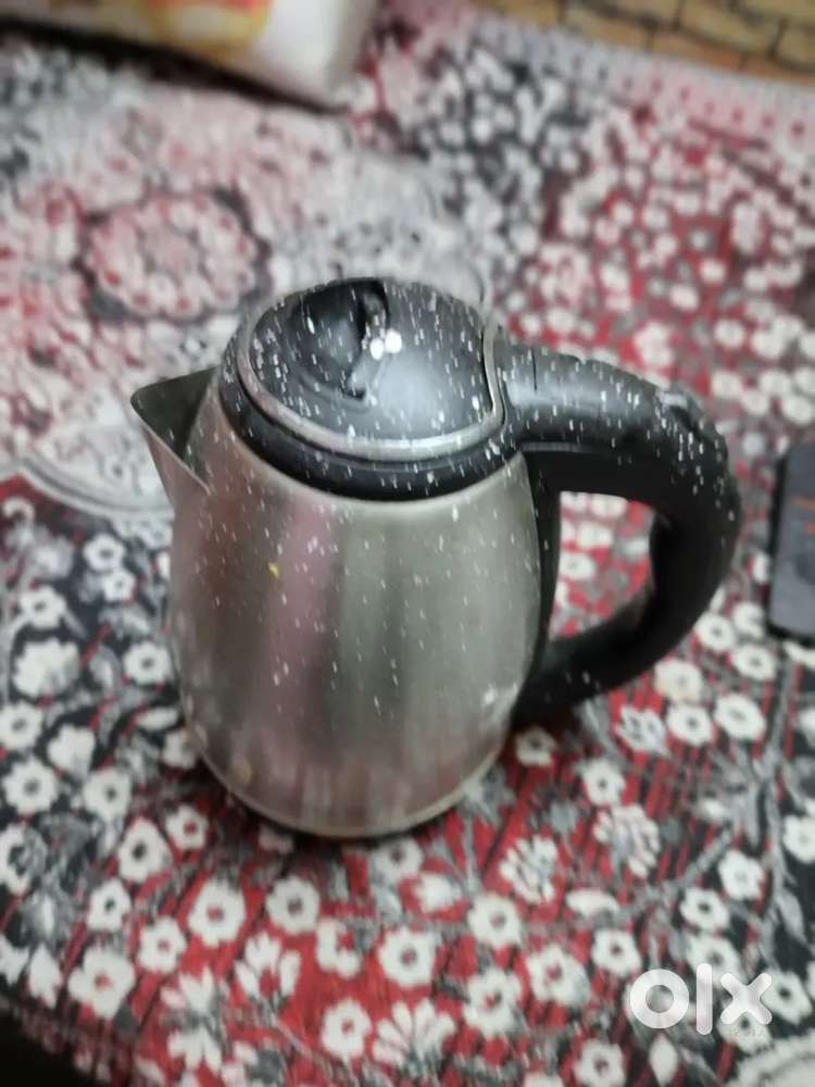 One plastic chair, electric kettle, 2 stool, and one wooden rack