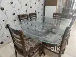 Dining table with 6 chairs new condition