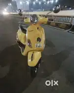Vespa brand in yellow colour.