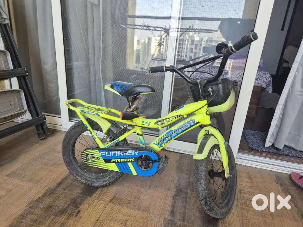 2 year old bicycle  14T , has supporters wheel as well.