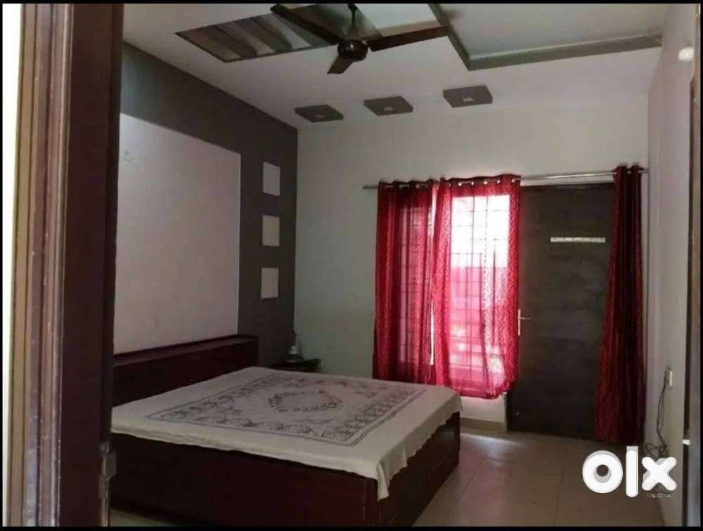 Fully furnished single room with attached bathroom and balcony.