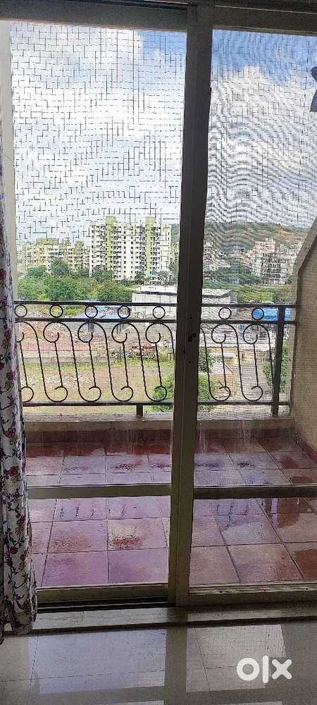 Well maintained ventilated with ample light semi furnished flat