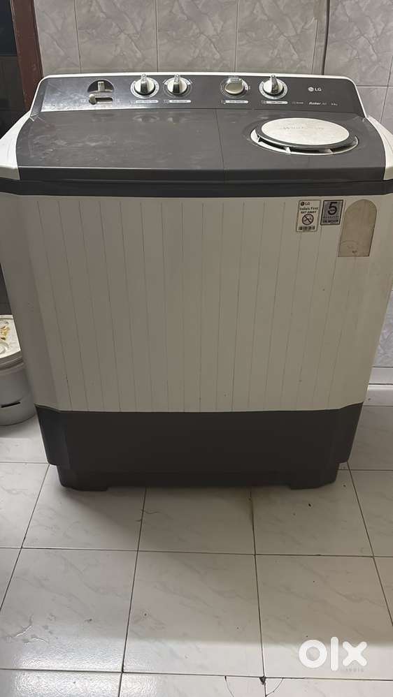 LG semi-automatic top-load washing machine.