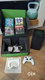 Xbox Series X 1TB Game Console with white controller and 4 games used