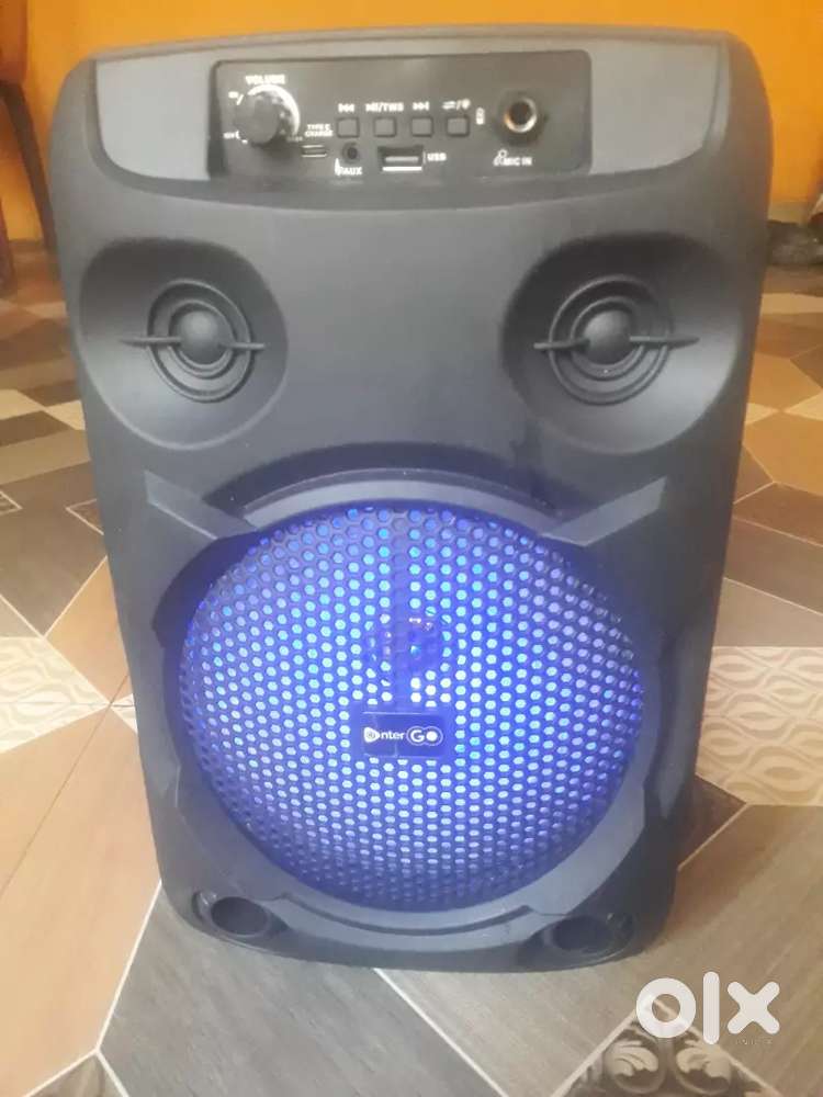 Party blaster bluetooth speaker with mic & 1 year warranty.
