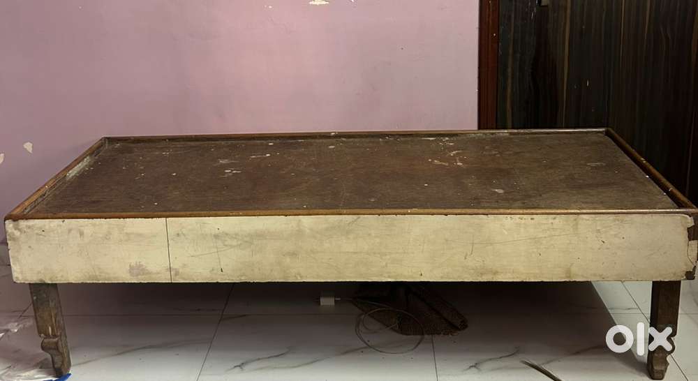 Wooden single bed