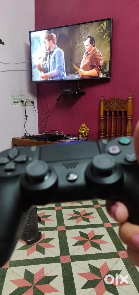 PS4 gaming console with wireless remote