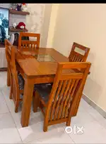 Brand new 4 seater wooden dining table with chairs at factory prices