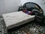 Antique bed with brass and mirror work