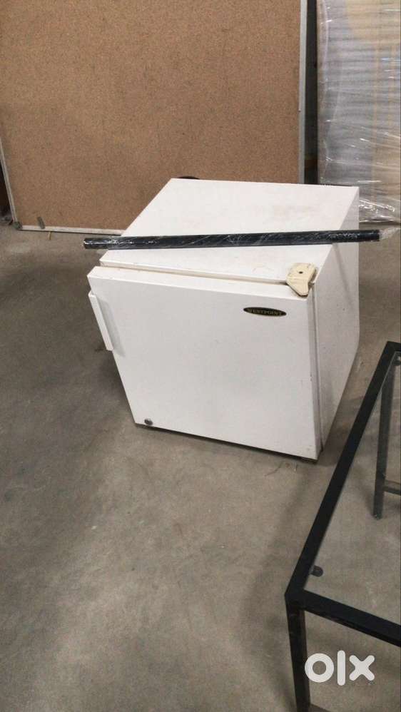 Mini fridge and table