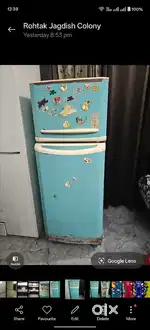 Old fridge for sell good cooling nd lots of space 2 cabin with stand
