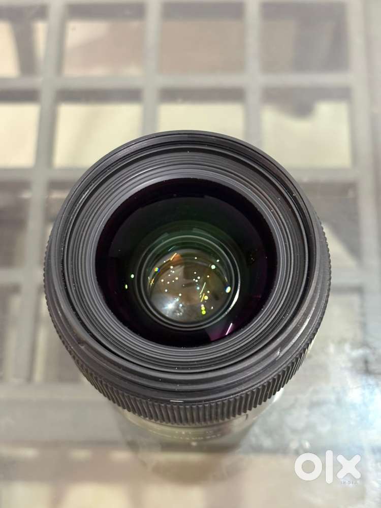 For sale: Sigma 35mm f/1.4 lens, 2 years old, in excellent condition.”