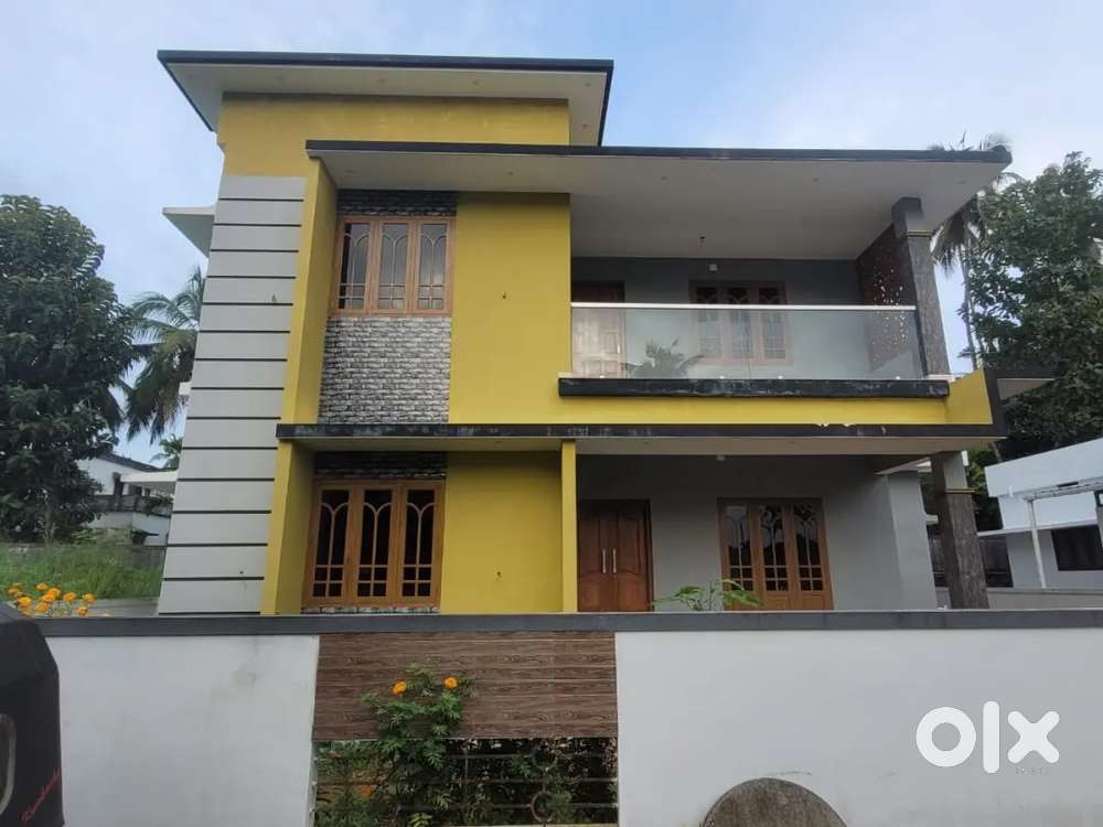 A MAGNIFICENT NEW 3BED ROOM 1650SQ FT 5.75CENT HOUSE IN OLLUR,THRISSUR