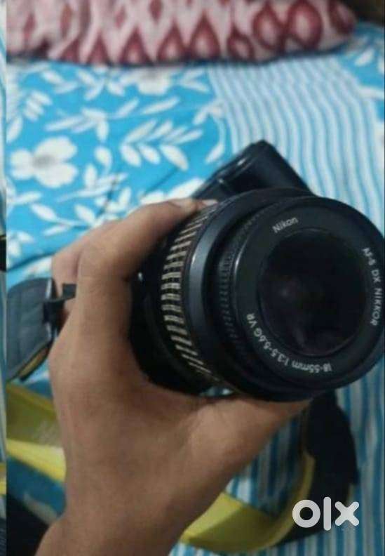Nikon D3100 with 18×55mm lens