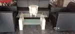 Kurl on branded leatherite 5 seater sofa with centre table for sale.