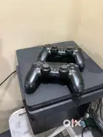 Ps4 slim 1TB FOR SALE WITH 2 original joysticks