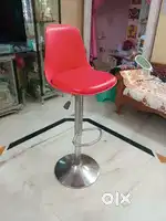 Red high counter chair in new and excellent condition