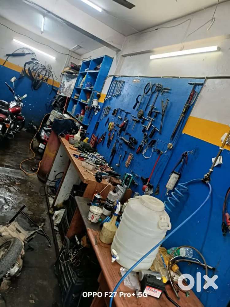 Running Two wheeler garage and washing centre with complete setup