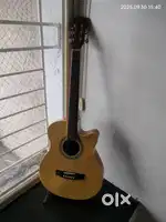 Semi Acoustic Guitar for only 7000!