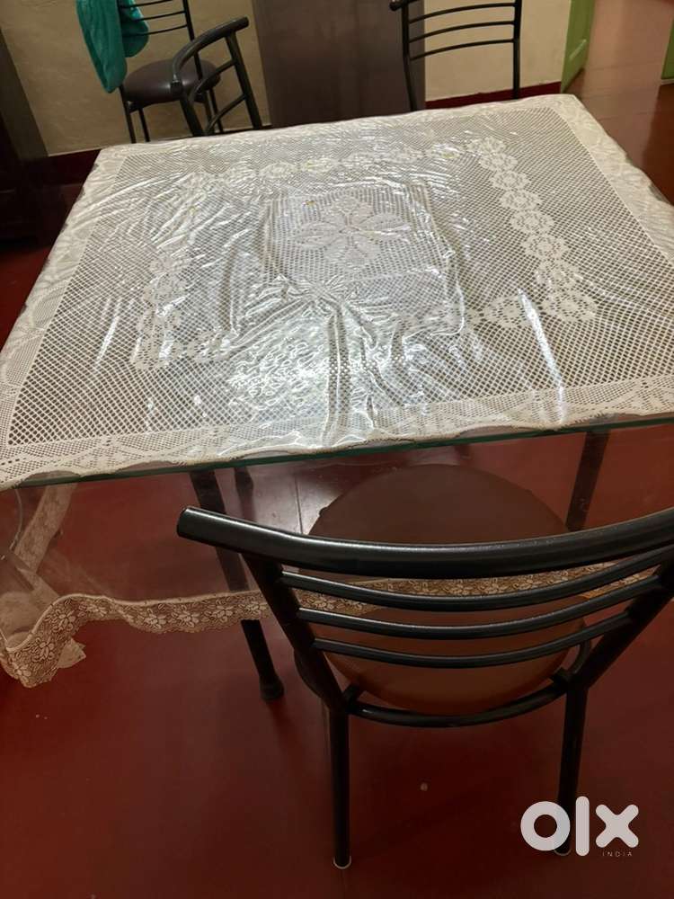 Glass top table dining set