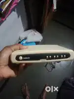 Hathway cable tv set off box and tenda 300 mbps router