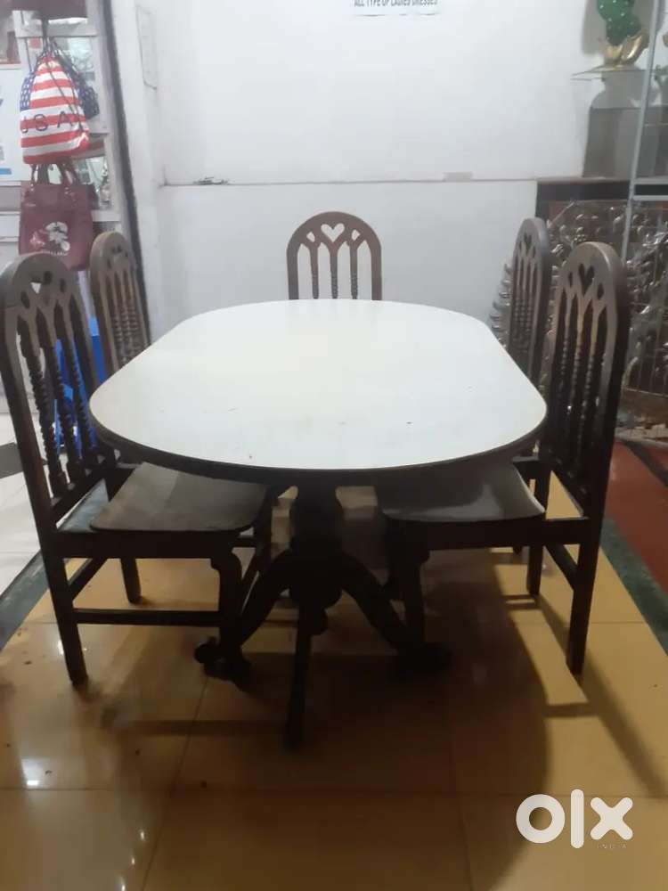 TeakWood Dining Table with 5 Chairs..