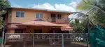 60 cents land with 2000 sq feet 2 storeyed house at 9th mile , Mundur