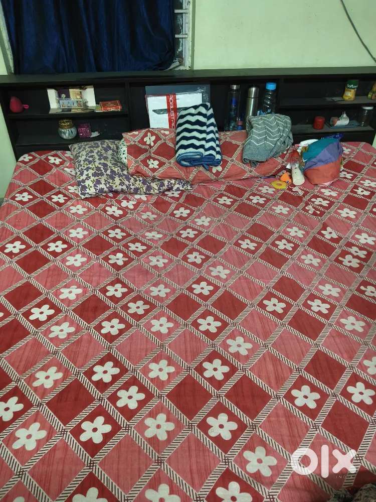 Double king size bed with mattress.