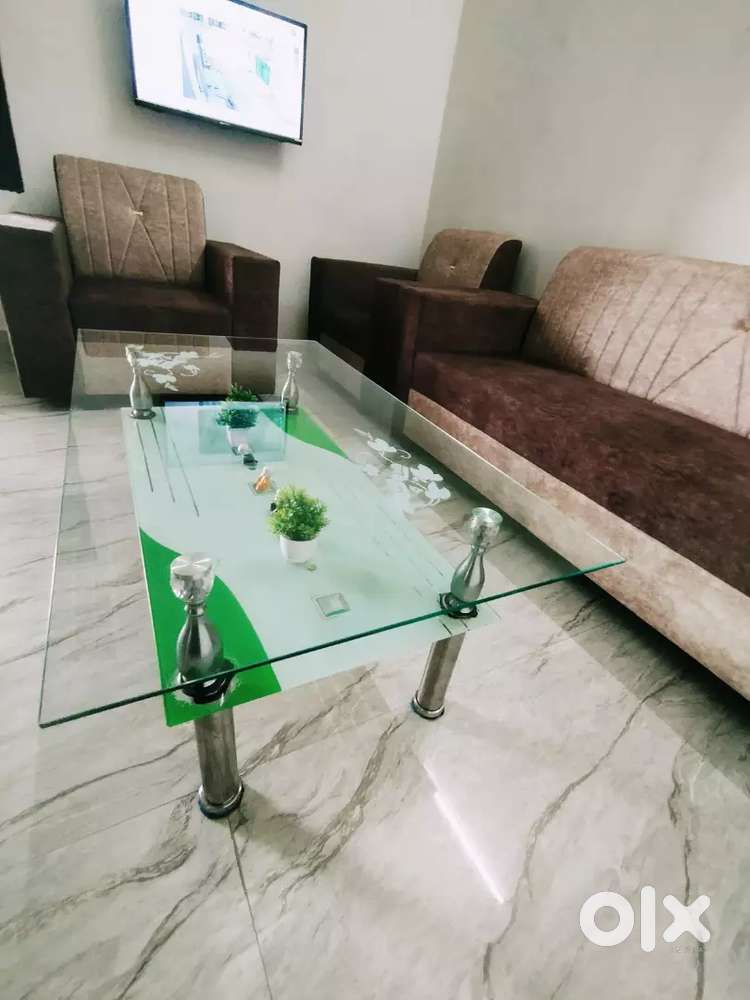 5 seater sofa with center glass table
