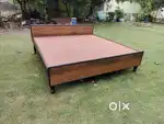 Wooden new unused standard height double bed without storage