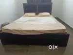 Double cot bed with headboard