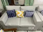 Sofa 2 seater with grey leatherite fabric 3 pcs 8000 per piece.