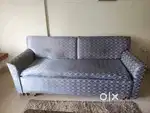 Wooden sofa in used condition