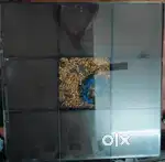 Square wooden table with glass top