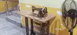 Sewing machine and stand
