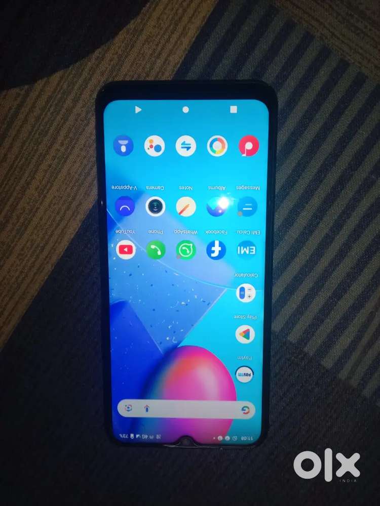 With box and original charger