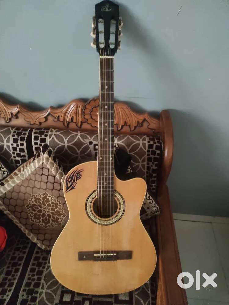 Pluto acoustic guitar