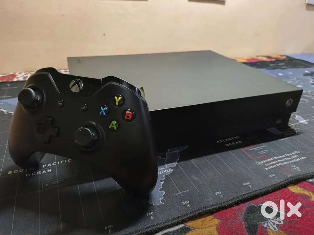 Xbox one x 1tb with games and controller