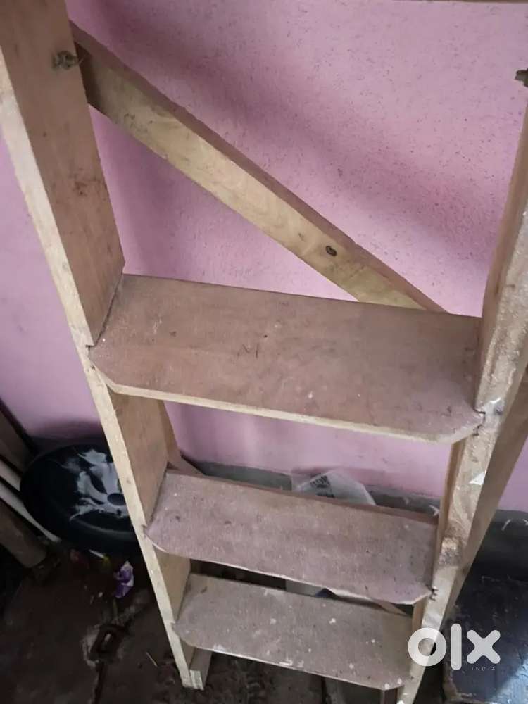 A wooden ladder for sale at cheap price